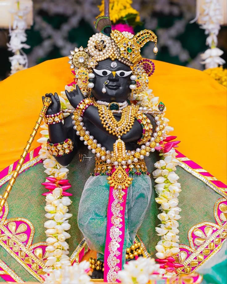 Śrī Rādhā-ramaṇa dressed with ornaments and garlands
